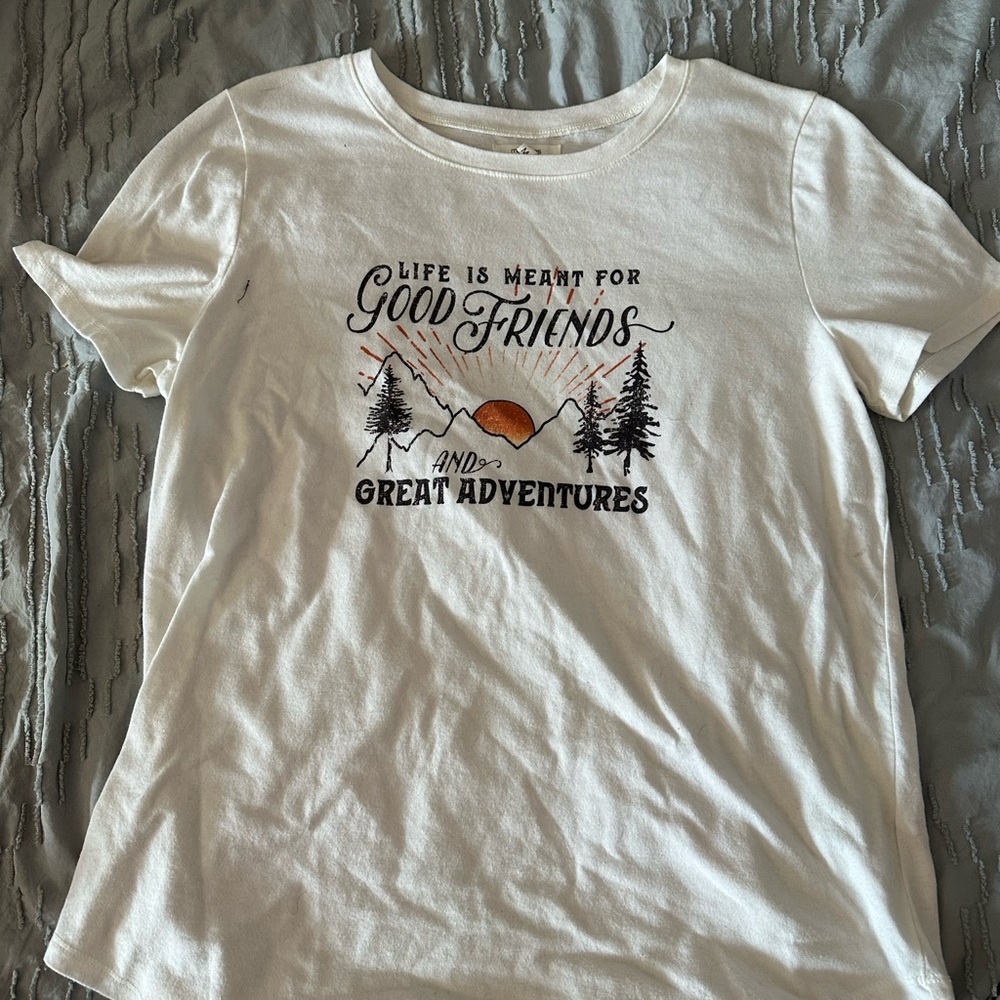 white maurice’s tshirt